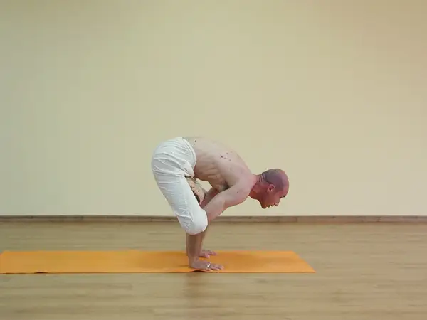 Urdhva Kukkutasana