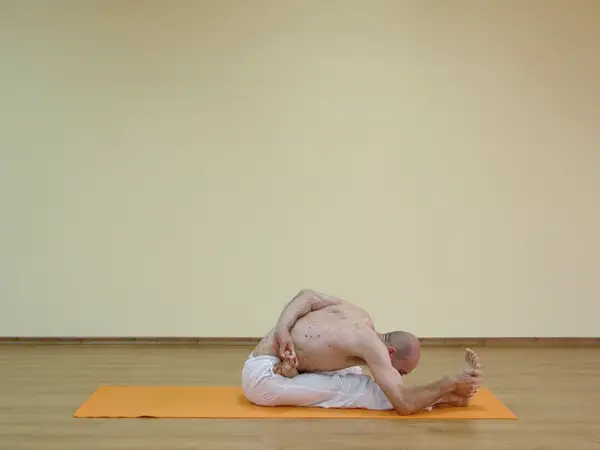 Ardha Baddha Padma Paschimottanasana
